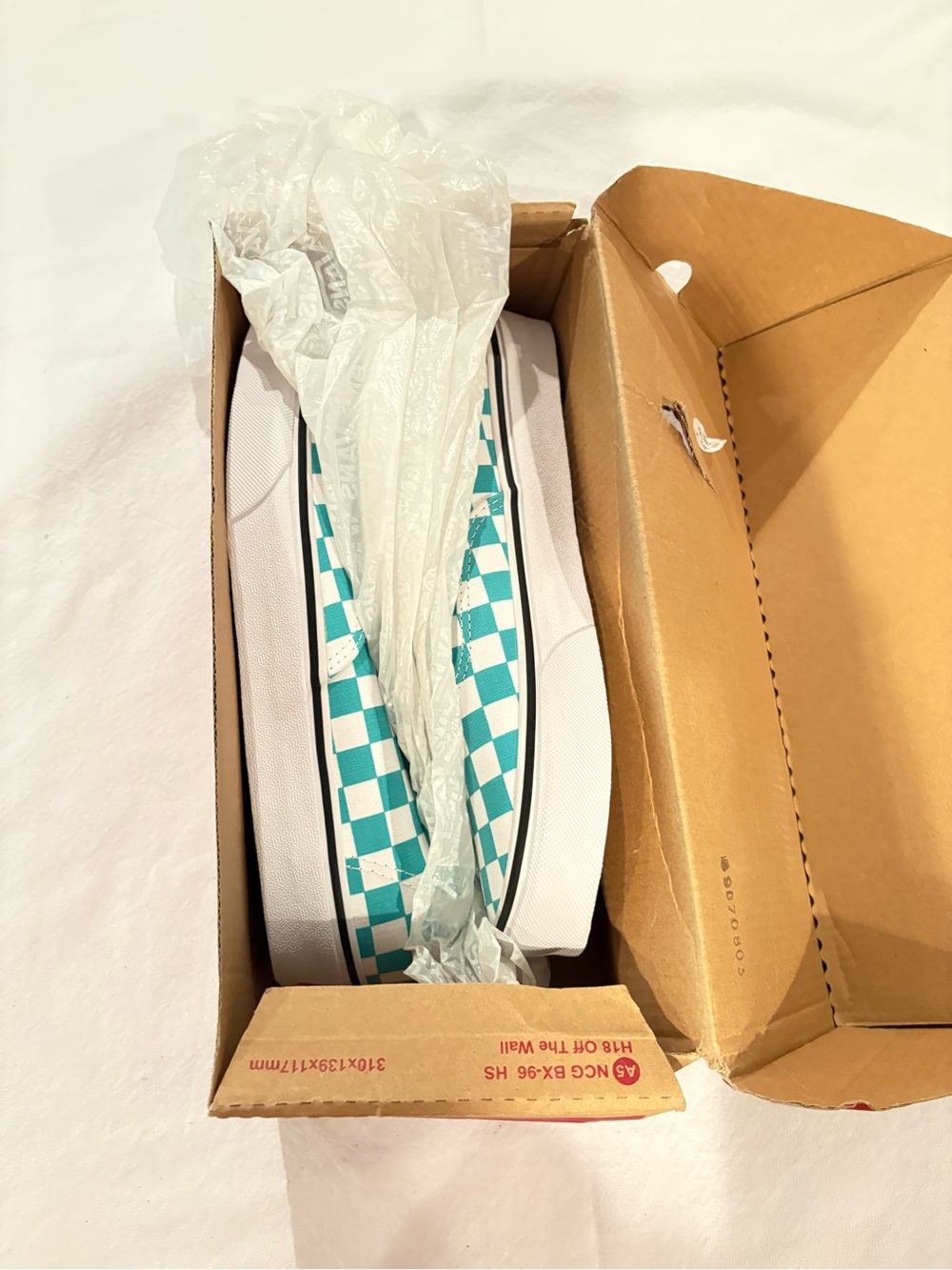 Vans Classic Slip-On Sneakers in Teal and White Checkerboard